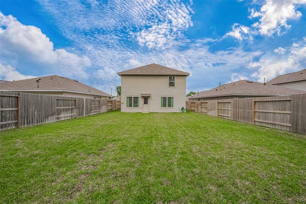 Expansive backyard offering endless potential for beautiful outdoor living projects.
