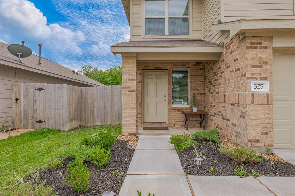 Cozy and welcoming front porch.