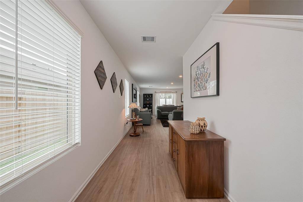 Bright entry hallway that sets a warm and inviting tone