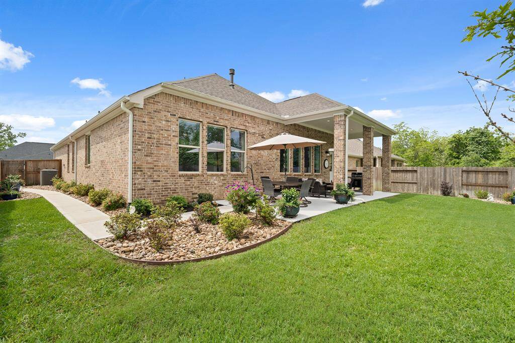 This Backyard is lush, green, and low maintenance. It is the perfect place to entertain groups both big and small. Whether lounging in a hammock under the sunshine or enjoying your morning coffee and a good book under the cover of the Porch, this space is sure to aid in relaxation and peace.