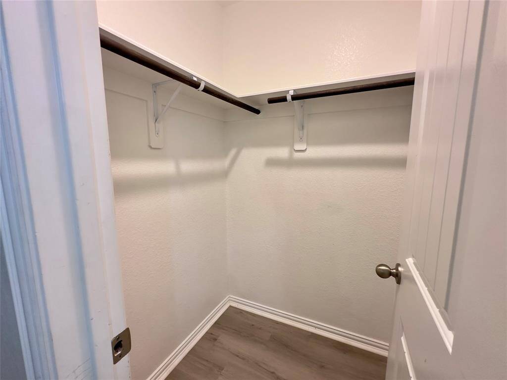 Spacious upstairs closet in the third guest bedroom.