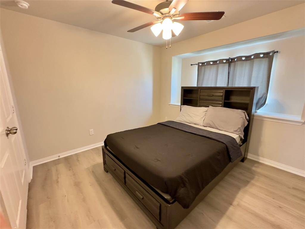 Upstairs guest bedroom perfect for comfort and privacy.