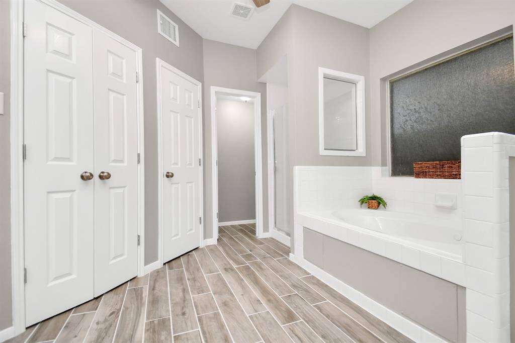 giant tub and separate shower
