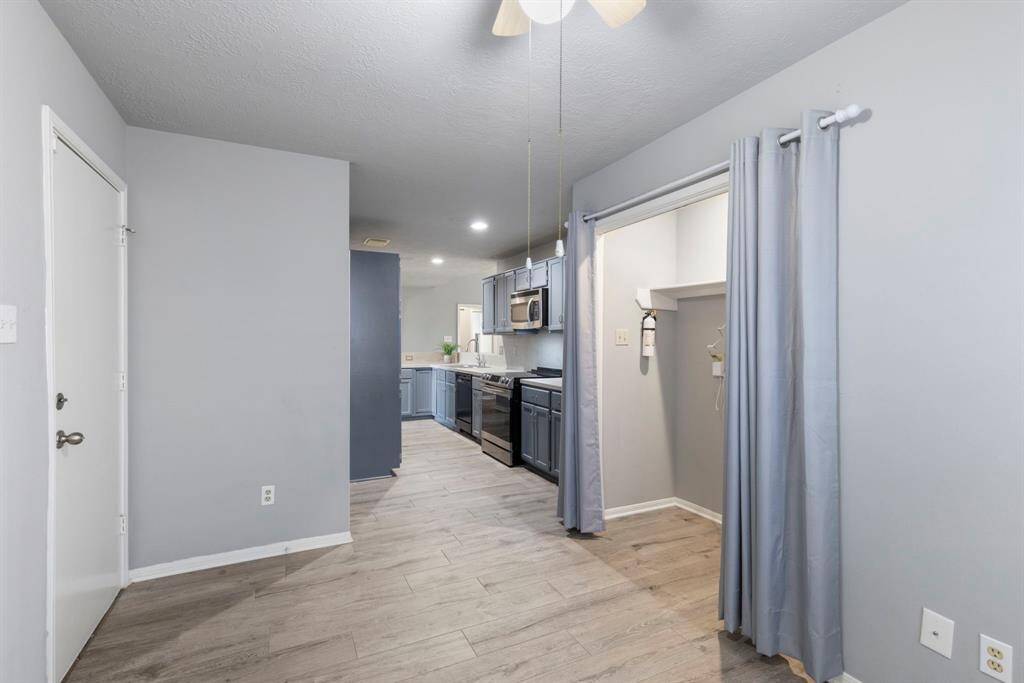 Conveniently located laundry area is easily accessible.