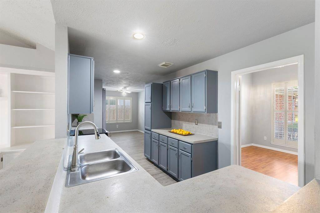The kitchen opens to the formal dining room, making hosting guest a breeze.