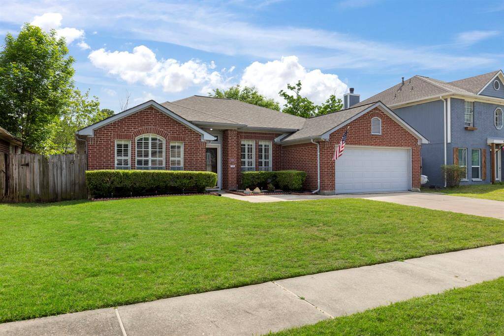 The charming plantation shutters make for a nice curb appeal.
