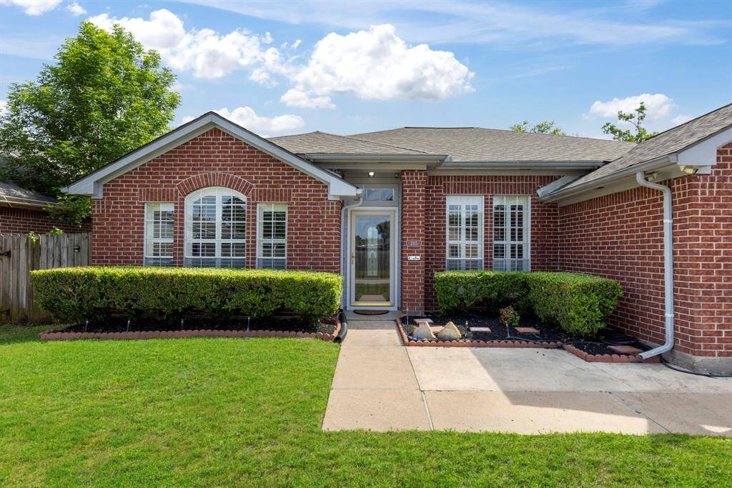 Enjoy the wide paved front walkway leading to the front entrance.