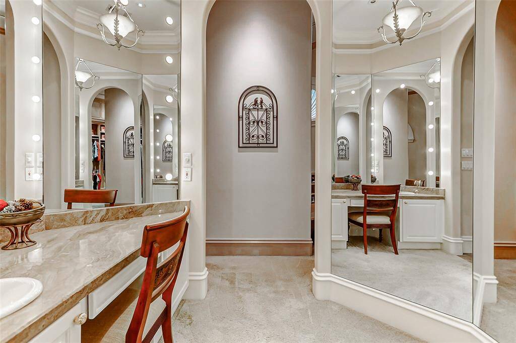 Dressing area leading into the primary closet.