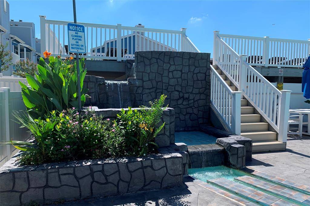 Everyone loves a waterfall, especially by the pool