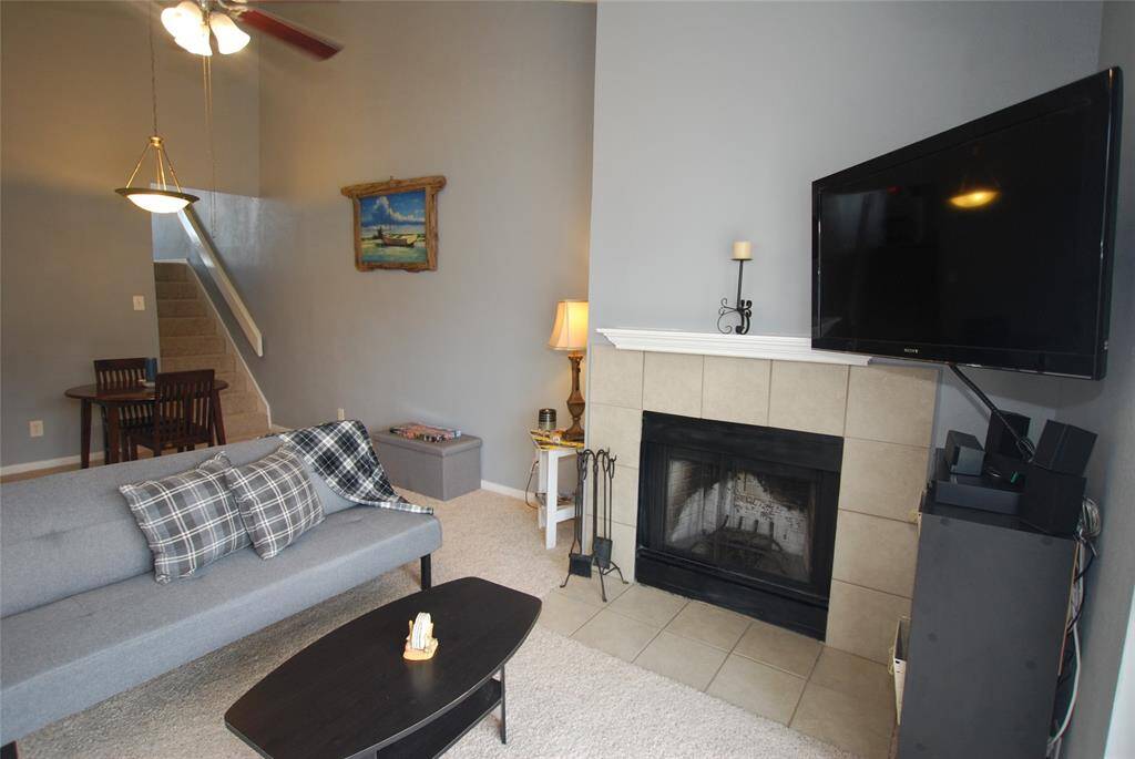 Rare condo fireplace is nice on cool evenings.