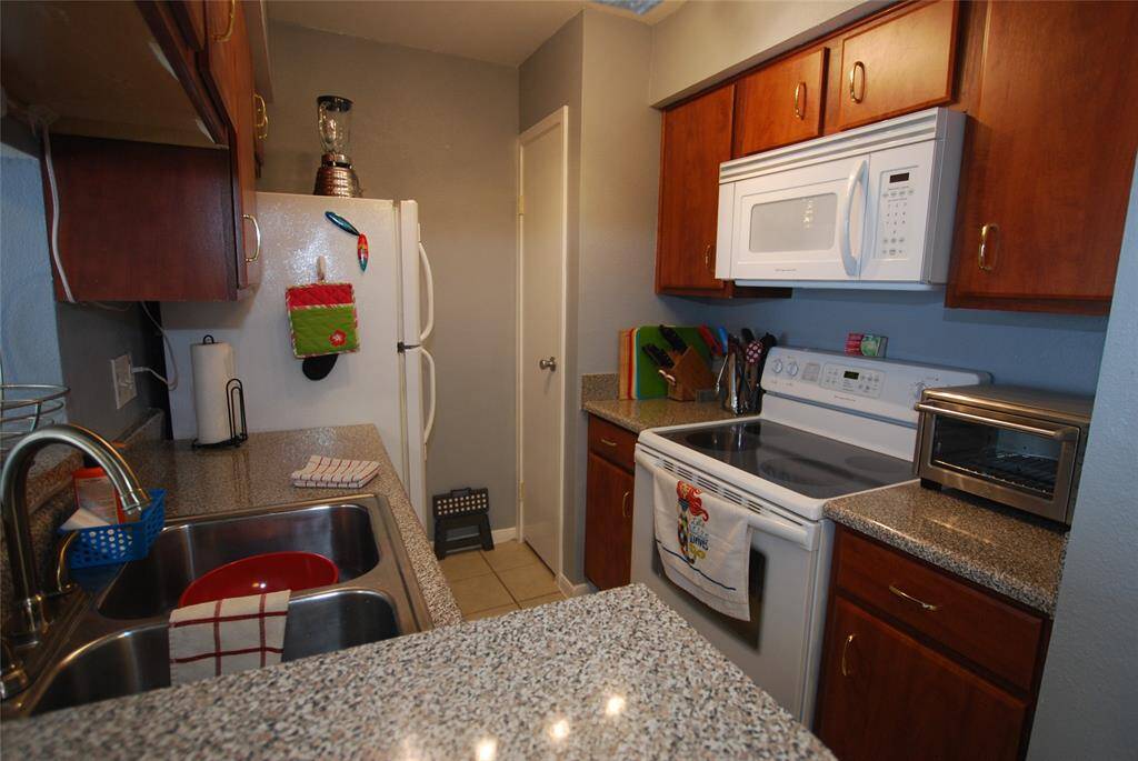 All kitchen appliances convey with the condo.
