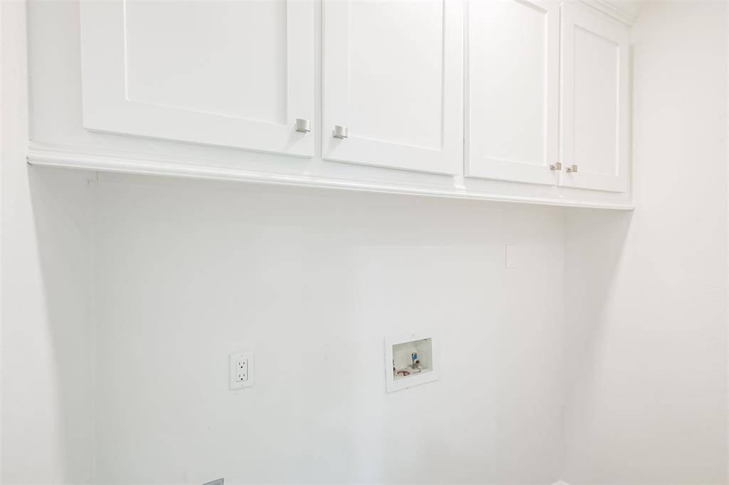 Laundry area inside of home.