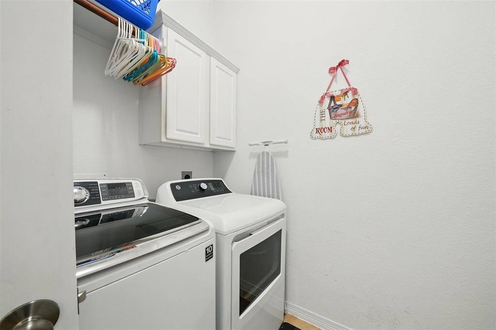 Laundry room with extra storage on the 1st floor