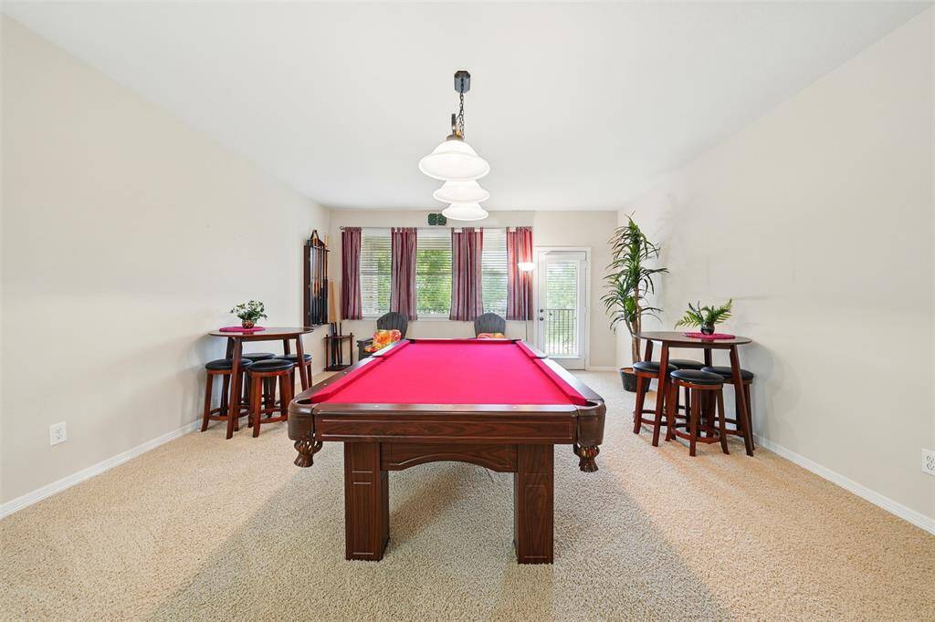 The enjoyable games room has a bar and snooker table.