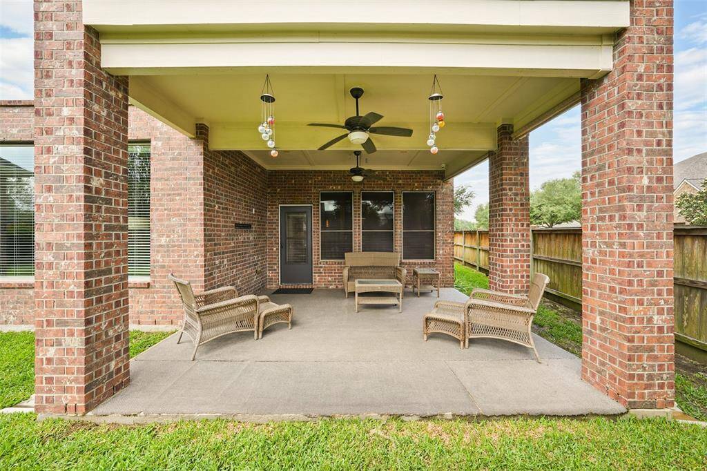 Nice gathering in the covered Patio with ceiling fan