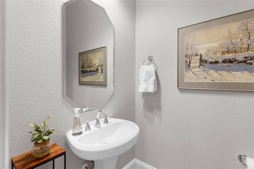 Convenient half bath downstairs.