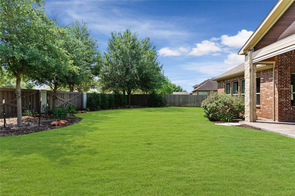 Perfect amount of trees and space with luscious grass.