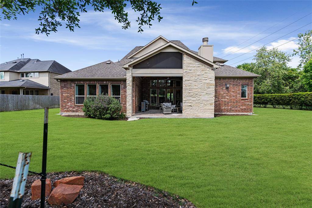 This large backyard with extended patio is ready for you to enjoy!