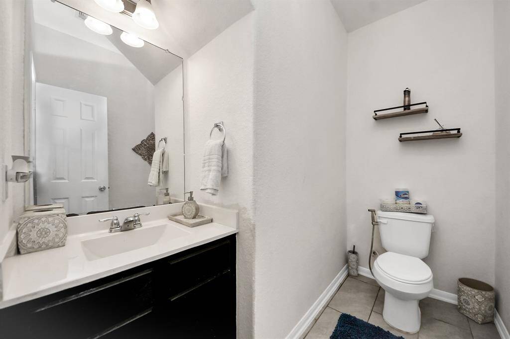Convenient half bath, perfect for guests.