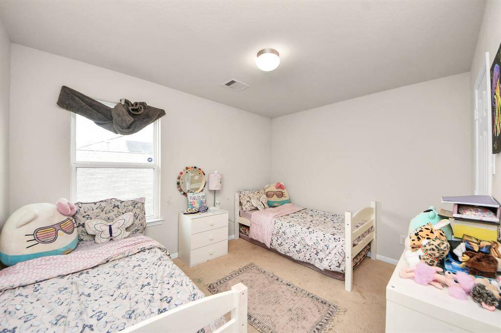 Bedroom 5 features a walk-in closet, offering ample storage.