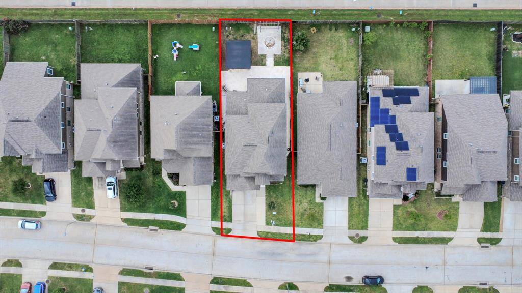 The stunning aerial view showcases the home's expansive layout.