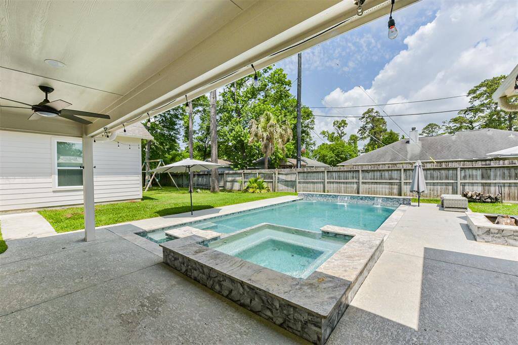Relax in your saltwater heated pool and hot tub oasis