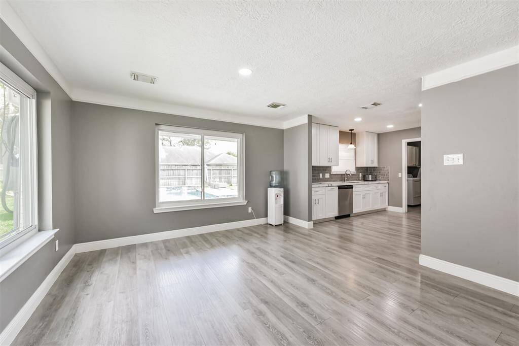 Dining room area open to kitchen and living areas