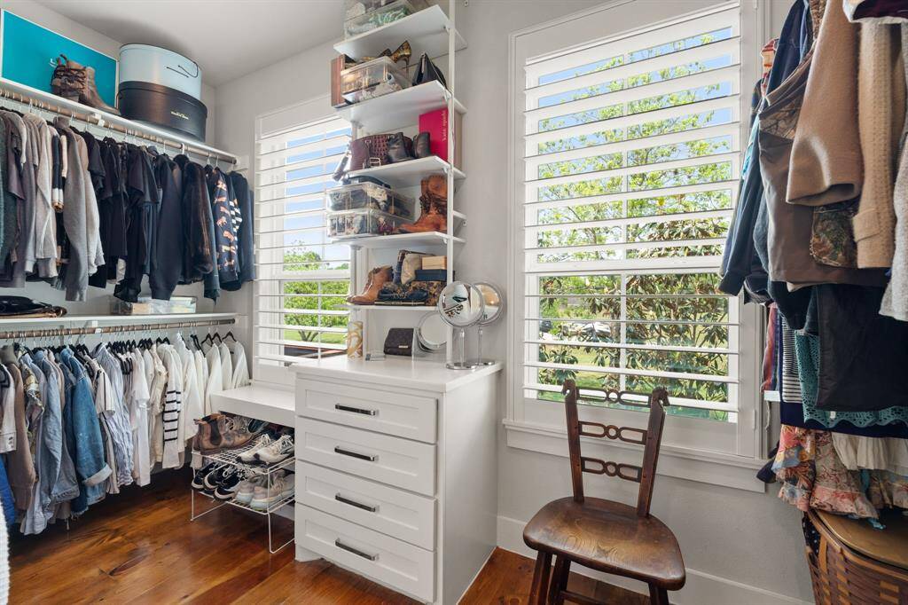 Step into a generously sized master closet designed to accommodate wardrobes of all sizes