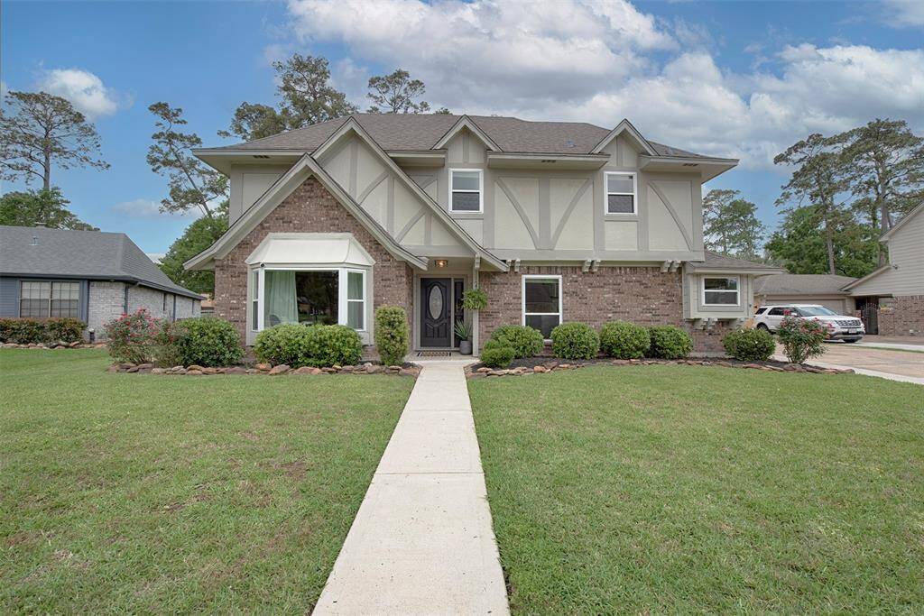 Gorgeous Custom Tudor stye home located in a quiet neighborhood close to great shopping, parks, restaurants and schools.