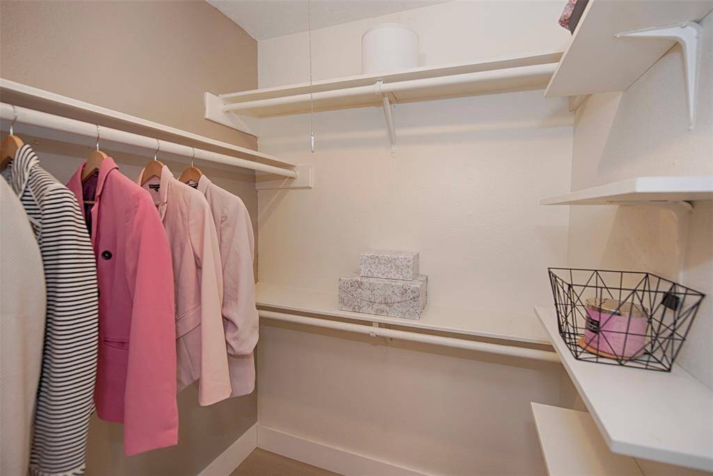 Ensuite bathroom also provides two walk in closets.
