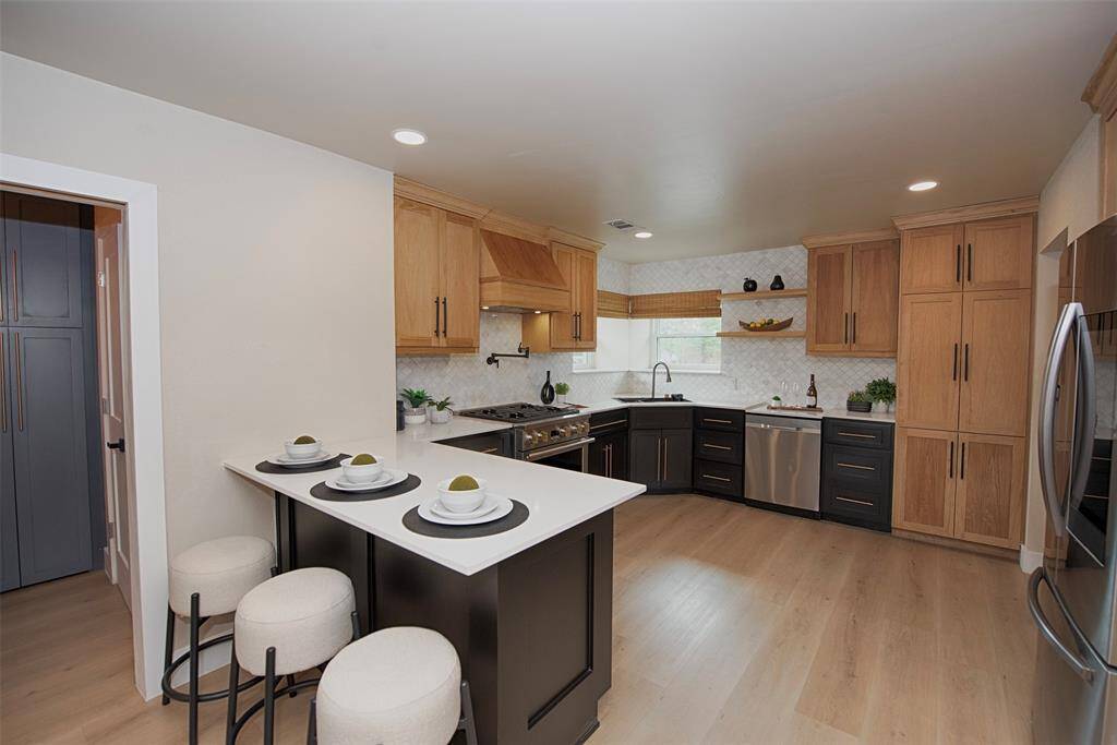 Kitchen features a great breakfast bar for your morning coffee or meals on the go.