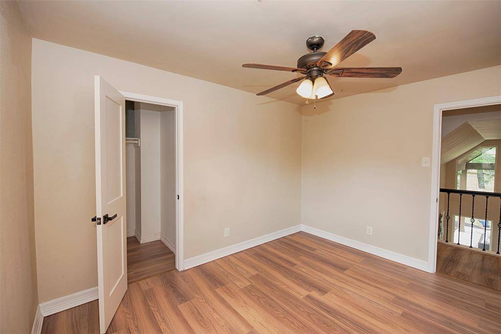 A view of the room showing access from the catwalk as well as access to a Jack n' Jill Bathroom.