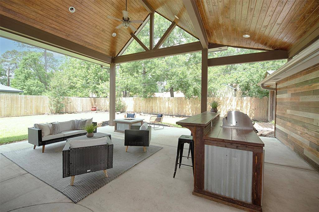 Imagine the great fun you will have entertaining with friends and family with this amazing patio with built in outdoor kitchen.