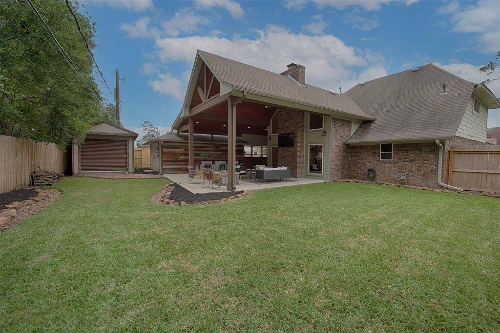 Backyard provides great space for outdoor fun for the kids to play or to toss a ball for the family dog.