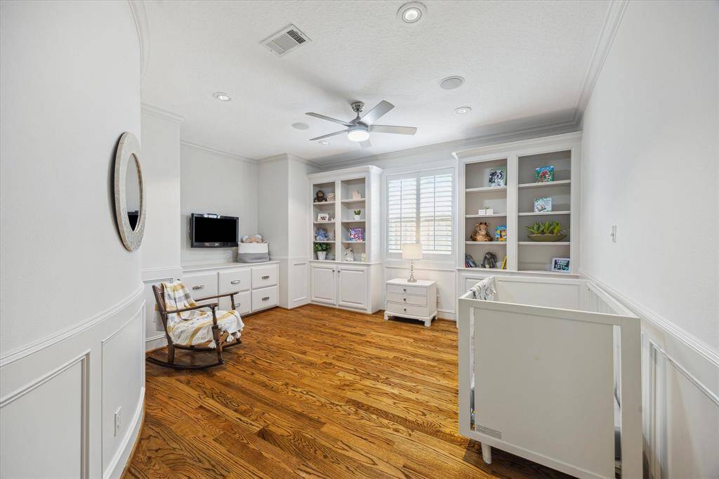 Spacious room designed for the 1st floor study with built-ins and cabinetry. Owner is currently using as a nursery.