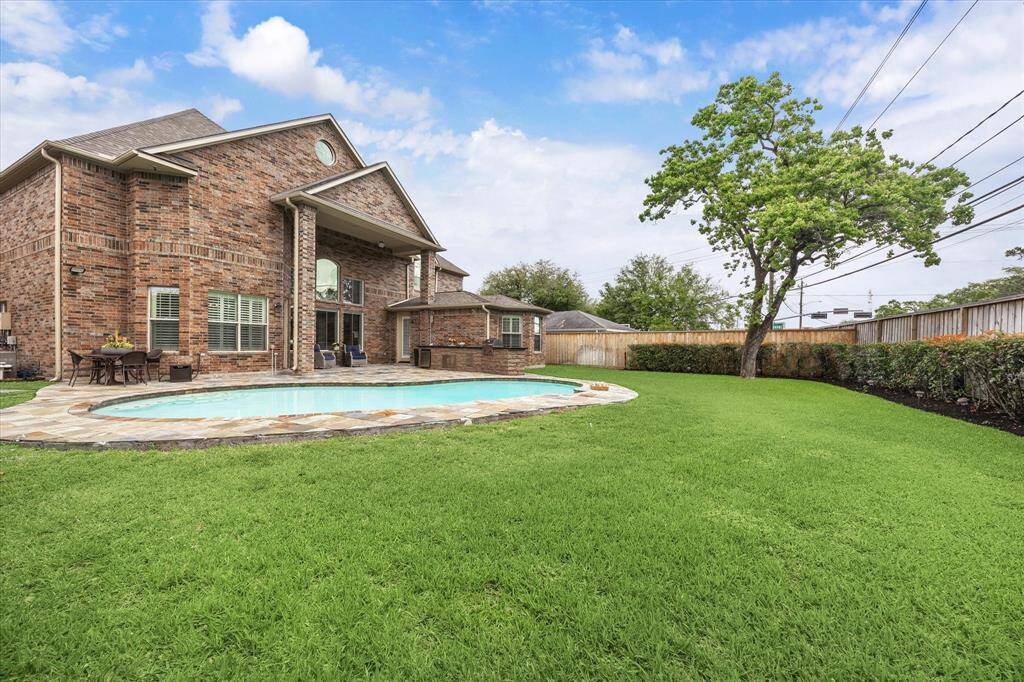 Enjoy your large backyard on this 13,038 sq ft lot.