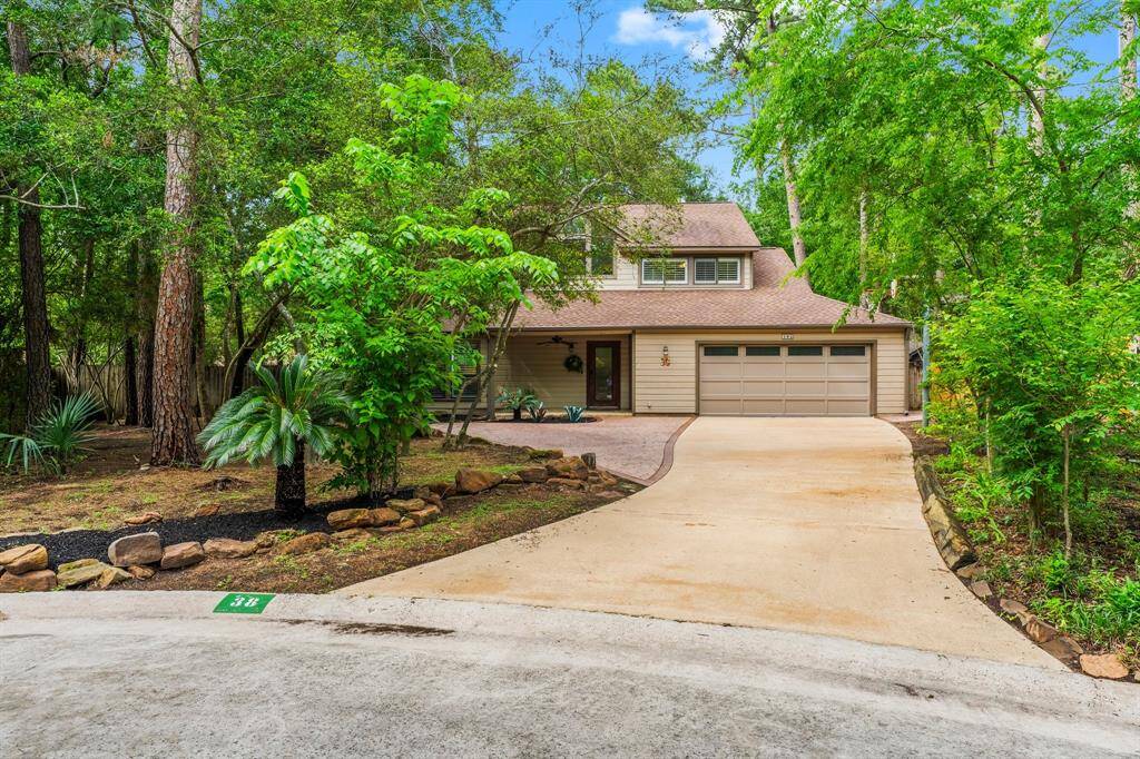 Nestled at the end of the cul de sac which provides a large wooded lot.