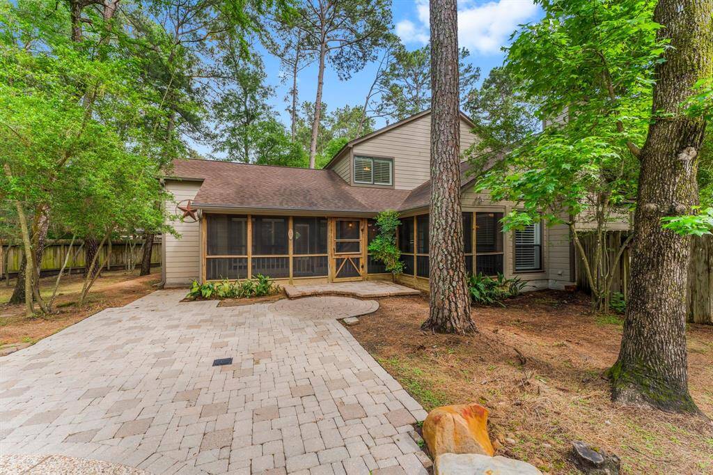 The large cul de sac lot circles the home offering so much space to enjoy the outdoors.