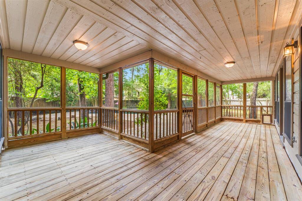 There is so much space to enjoy in this screened in patio.  At the end of the patio there is a access door for your pet as well.