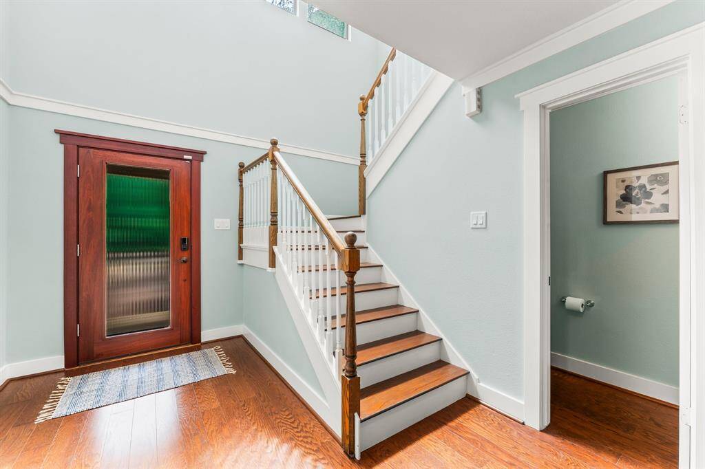 Light and bright entryway leads tot he heart of the home.  Don't mis the storage area under the stairs,