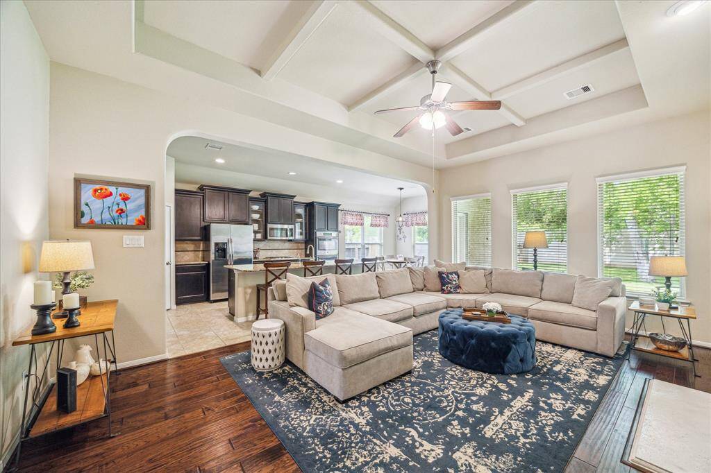 Imagine the sounds of chatter and laughter as you create memories of a lifetime with the people you love. This wonderful family room is the perfect place to do just that.