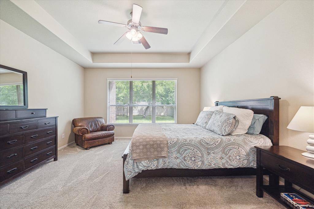 You’ll have sweet dreams in this posh owner’s retreat with a fresh neutral color palette and ample space for your California King and other large furnishings.