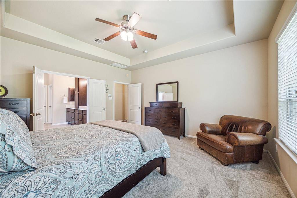 The owner’s suite offers a wonderful space to begin and end your day, with warm, inviting finishes, abundant natural light, and plenty of room to stretch out and relax.