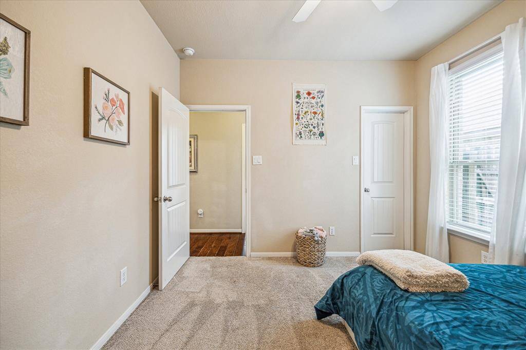 An alternative view of this guest room shows ample space for furniture, games, toys and more. This welcoming space is complete with a large closet and easy access to a full updated bathroom.