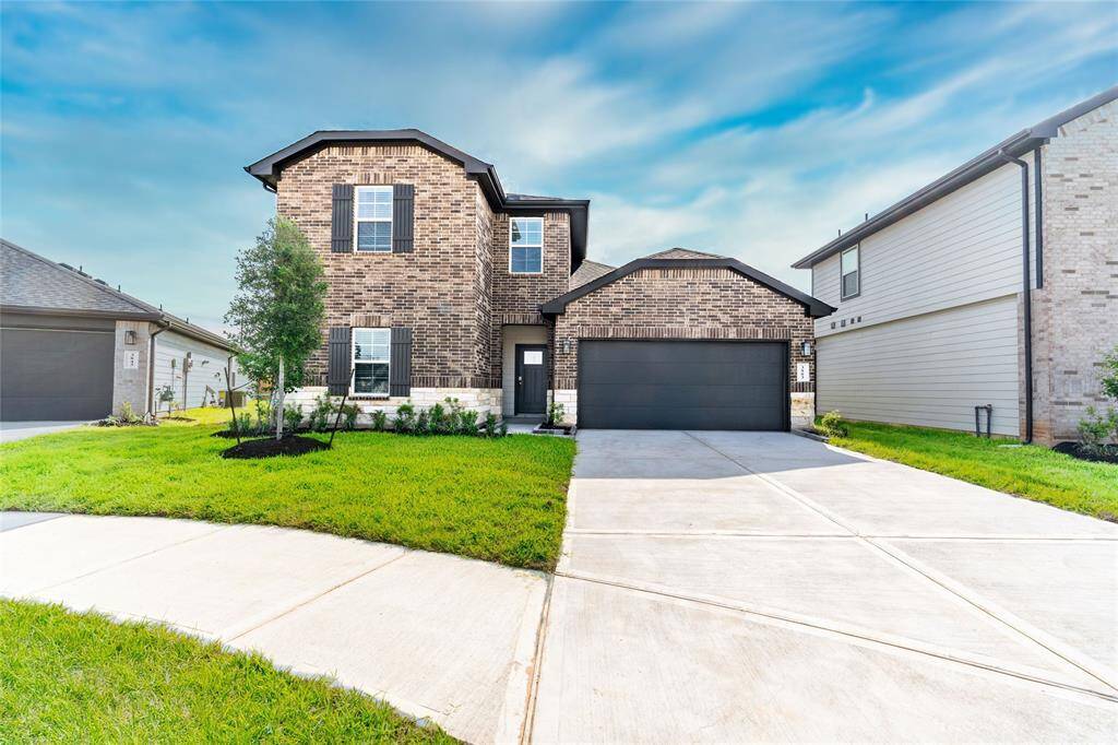 Beautiful brick and stone exterior. Located on a corner lot.
