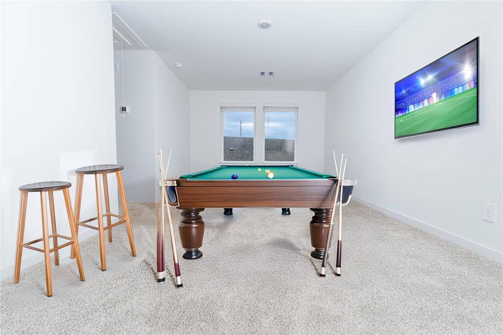 Virtually staged Flex/Game room.