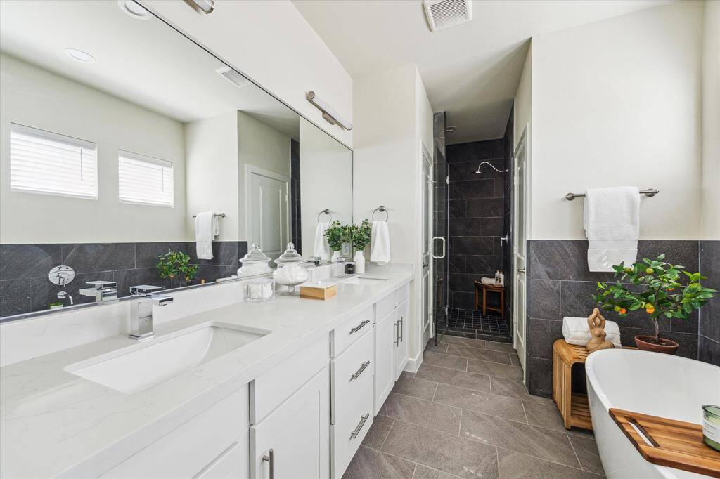 **Not of actual home, photos of another recently completed home within same community with similar plan & finishes**