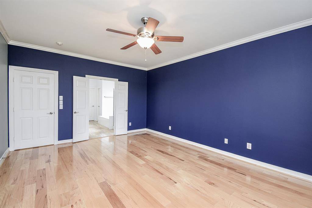 Double doors to the ensuite bath! Wood floors! Ceiling fan!
