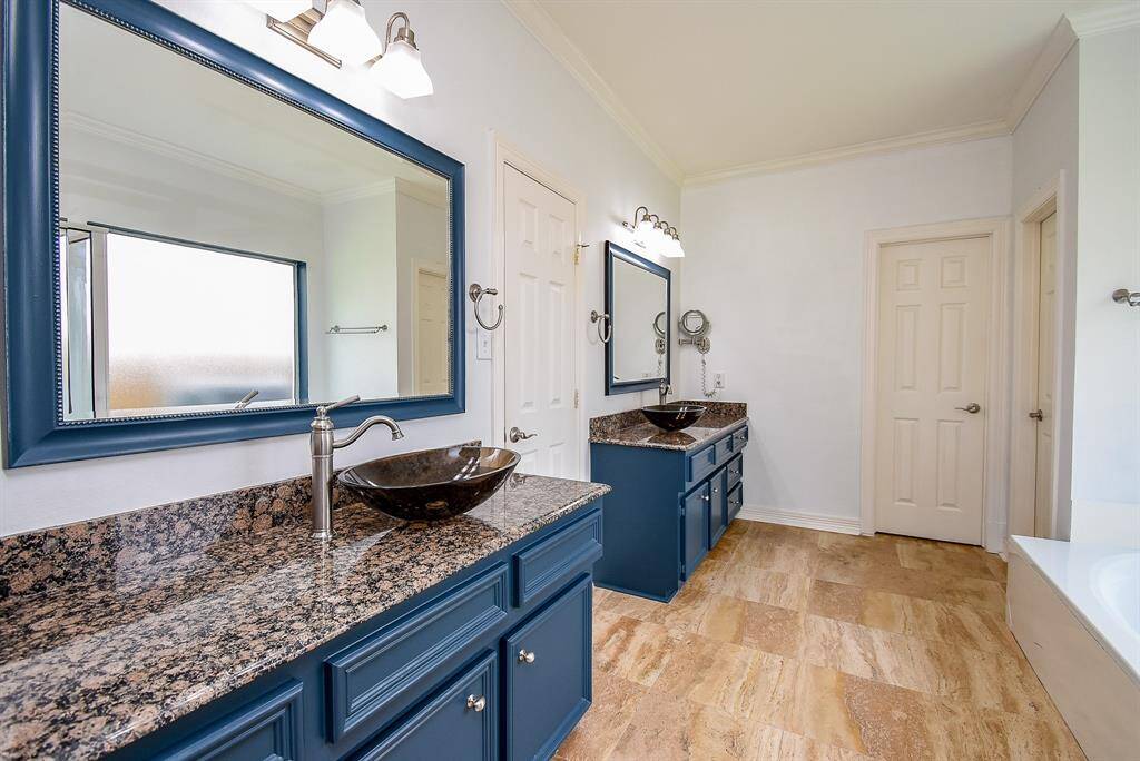 The primary bath boasts of granite counters, updated double sink basins and fixtures. There are 2 separate walk-in closets! LVP flooring in master bedroom closets, refreshed painting throughout the house and garage.