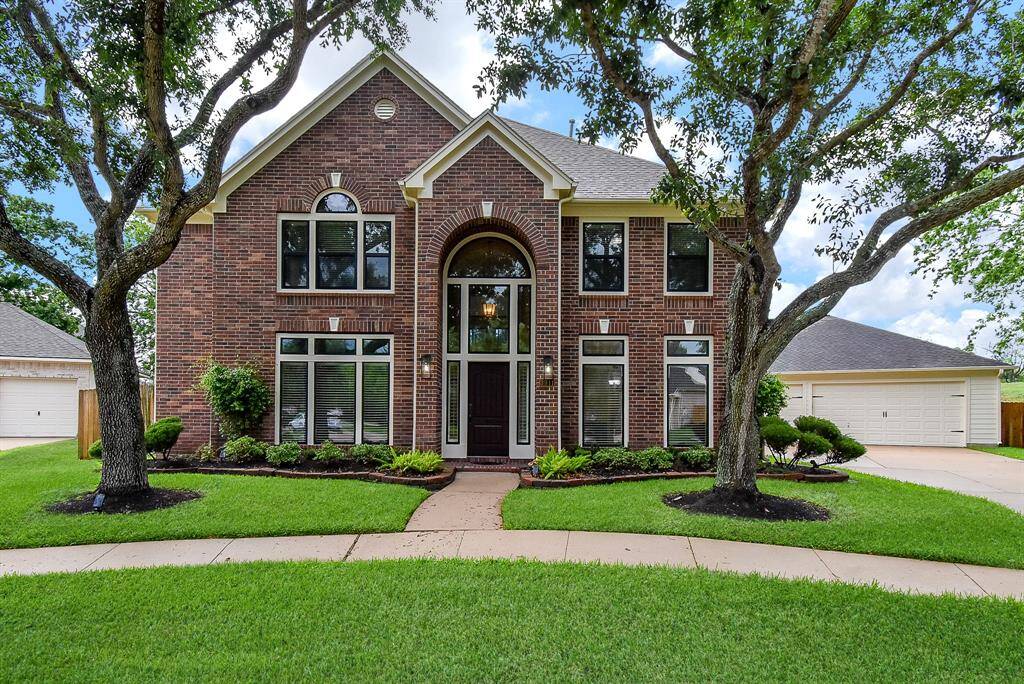 Fine curb appeal! Replaced 21 windows with Star Cardinal black exterior/interior framing aluminum windows with a Low E 366 energy efficiency double pane option. Updated outdoor coach lights on each side of entry.